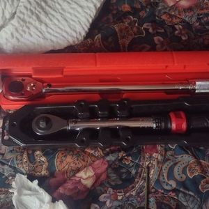 Clicker style microtork wrenches